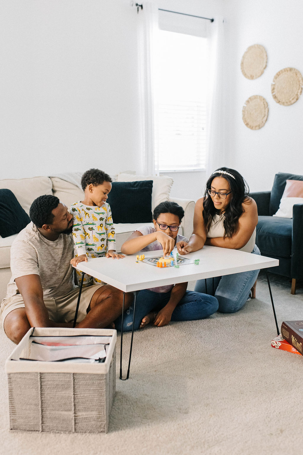 bianca dottin and her family having a game night at home